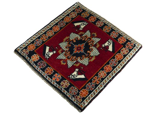 Corner detail of 1970s Shiraz rug showing border pattern and Wool pile