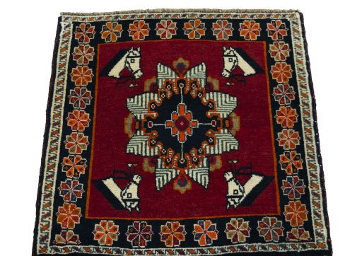 Surface texture of 1970s Shiraz rug with natural Wool and intricate pattern