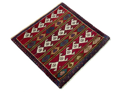 Close-up detail of 1970s Shiraz rug from Iran / Persia showing Wool weave