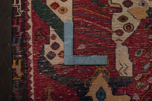 Backside of handmade 1970s Shiraz rug showing knot structure and weave density