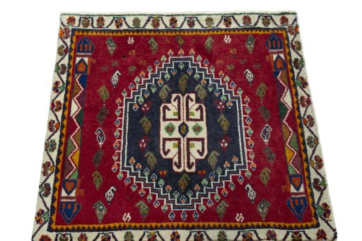 Surface texture of 1970s Shiraz rug with natural Wool and intricate pattern