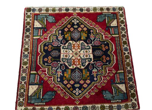 Surface texture of 1970s Shiraz rug with natural Wool and intricate pattern