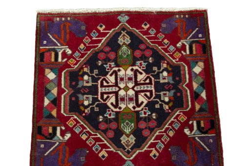 Surface texture of 1970s Shiraz rug with natural Wool and intricate pattern