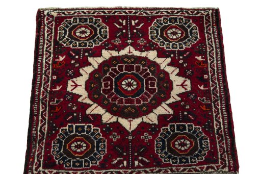 Surface texture of 1970s Shiraz rug with natural Wool and intricate pattern