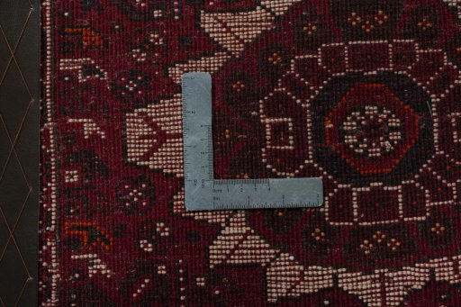 Backside of handmade 1970s Shiraz rug showing knot structure and weave density