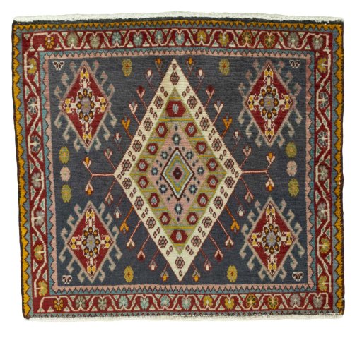 Full view of 1970s Shiraz rug from Iran / Persia, 60 × 64 cm in Red tones