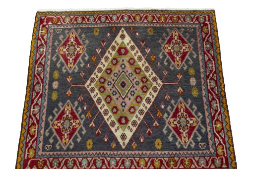 Surface texture of 1970s Shiraz rug with natural Wool and intricate pattern
