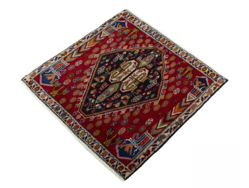 Corner detail of 1970s Shiraz rug showing border pattern and Wool pile