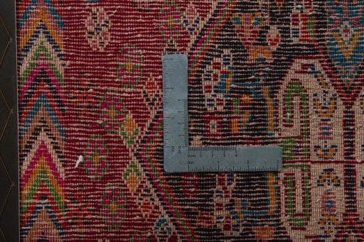 Backside of handmade 1970s Shiraz rug showing knot structure and weave density