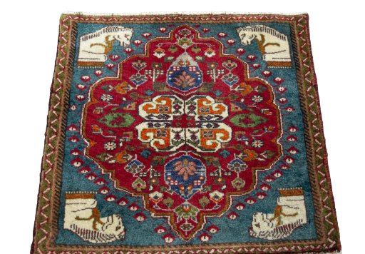 Surface texture of 1970s Shiraz rug with natural Wool and intricate pattern