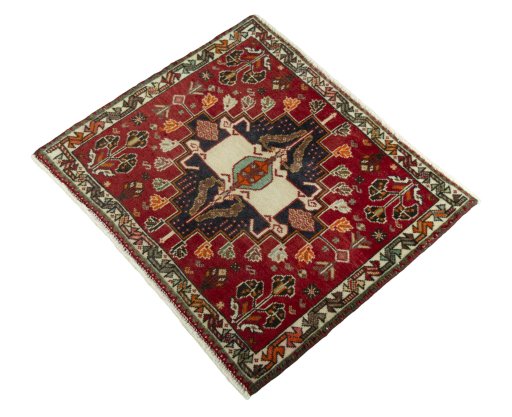 Corner detail of 1970s Shiraz rug showing border pattern and Wool pile