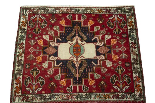 Surface texture of 1970s Shiraz rug with natural Wool and intricate pattern