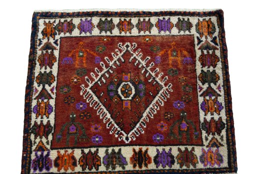 Surface texture of 1970s Shiraz rug with natural Wool and intricate pattern
