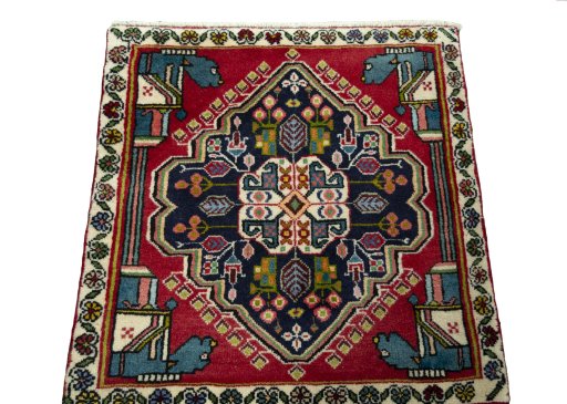 Surface texture of 1970s Shiraz rug with natural Wool and intricate pattern