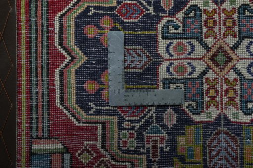 Backside of handmade 1970s Shiraz rug showing knot structure and weave density