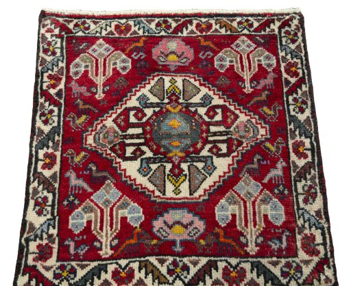 Surface texture of 1970s Shiraz rug with natural Wool and intricate pattern