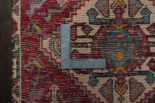 Backside of handmade 1970s Shiraz rug showing knot structure and weave density