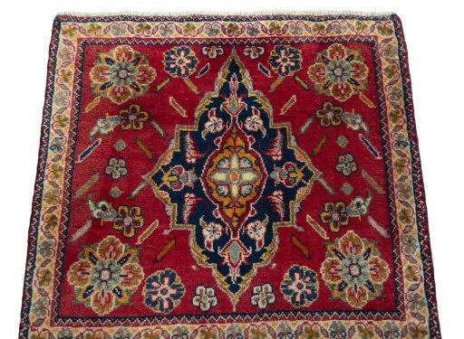 Surface texture of 1970s Shiraz rug with natural Wool and intricate pattern