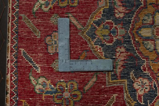 Backside of handmade 1970s Shiraz rug showing knot structure and weave density