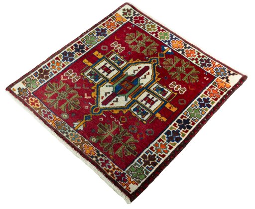 Corner detail of 1970s Shiraz rug showing border pattern and Wool pile