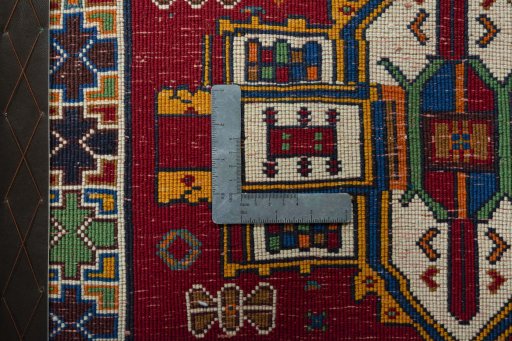 Backside of handmade 1970s Shiraz rug showing knot structure and weave density