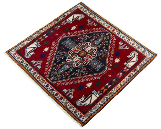 Corner detail of 1970s Shiraz rug showing border pattern and Wool pile