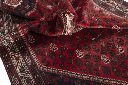 Close-up detail of 2000s Shiraz rug from Iran / Persia showing Wool weave