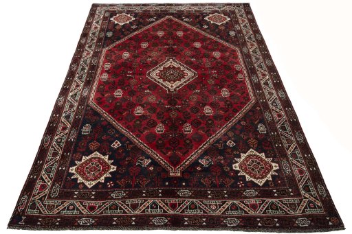 Surface texture of 2000s Shiraz rug with natural Wool and intricate pattern