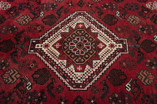 Central medallion detail of 2000s Shiraz rug from Iran / Persia