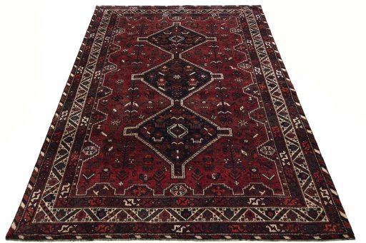 Surface texture of 2000s Shiraz rug with natural Wool and intricate pattern