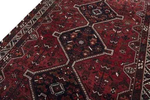 Backside of handmade 2000s Shiraz rug showing knot structure and weave density