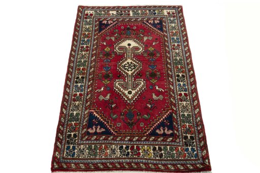 Surface texture of 2000s Shiraz rug with natural Wool and intricate pattern