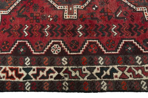 Full view of 2000s Shiraz rug from Iran / Persia, 158 × 110 cm in Red tones