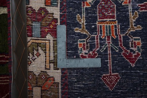 Close-up detail of 2000s Shiraz rug from Iran / Persia showing Wool weave