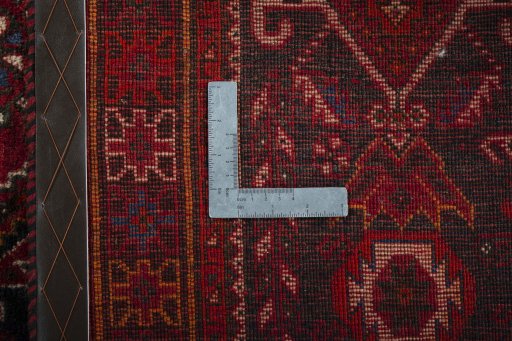 Surface texture of 2000s Shiraz rug with natural Wool and intricate pattern