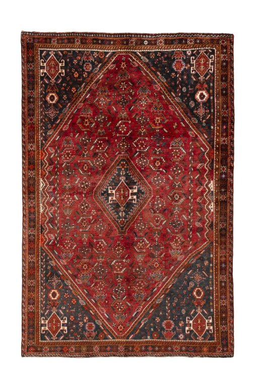 Full view of 2000s Shiraz rug from Iran / Persia, 275 × 180 cm in Red tones