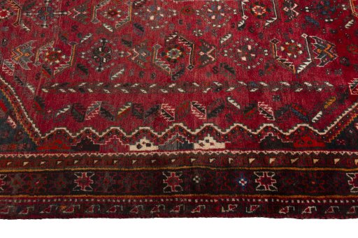 Full view of 2000s Shiraz rug from Iran / Persia, 275 × 180 cm in Red tones