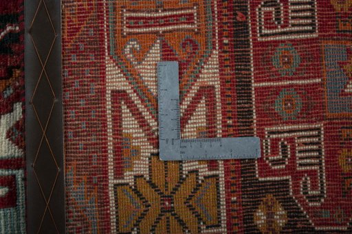 Surface texture of 2000s Shiraz rug with natural Wool and intricate pattern