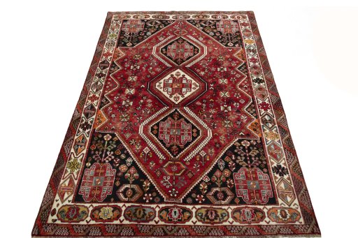 Surface texture of 2000s Shiraz rug with natural Wool and intricate pattern