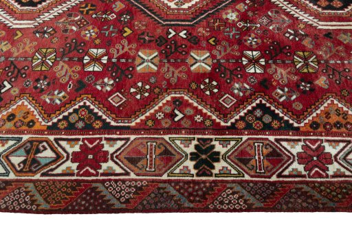 Full view of 2000s Shiraz rug from Iran / Persia, 273 × 177 cm in Red tones