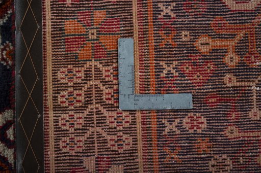 Surface texture of 2000s Shiraz rug with natural Wool and intricate pattern