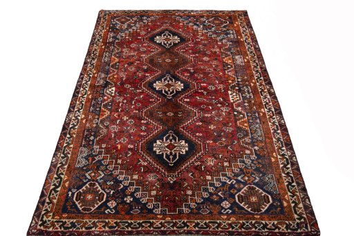 Surface texture of 1970s Shiraz rug with natural Wool and intricate pattern