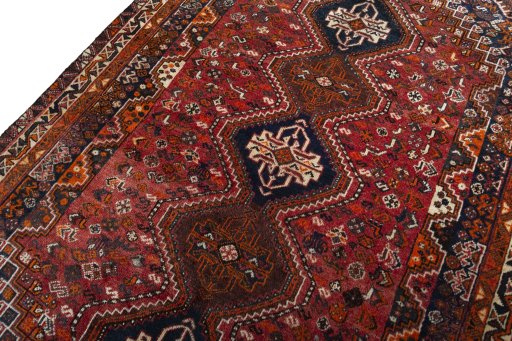 Backside of handmade 1970s Shiraz rug showing knot structure and weave density