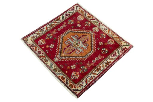 Corner detail of 2000s Shiraz rug showing border pattern and Wool pile
