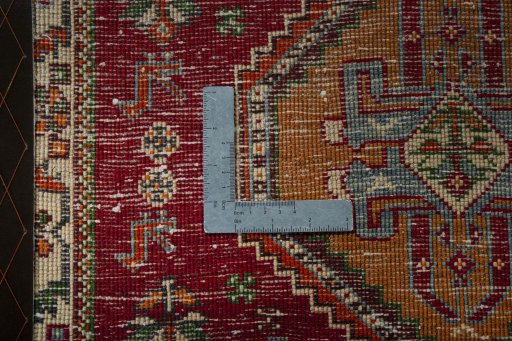Backside of handmade 2000s Shiraz rug showing knot structure and weave density