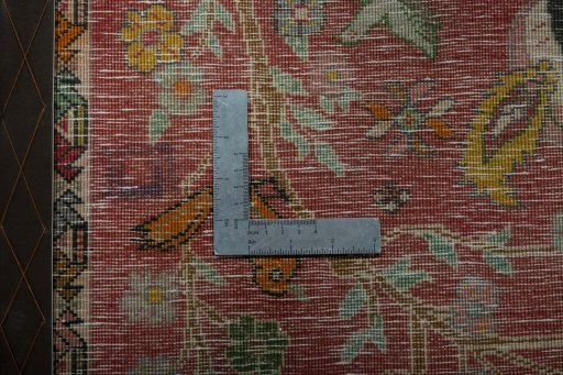 Backside of handmade 2000s Shiraz rug showing knot structure and weave density