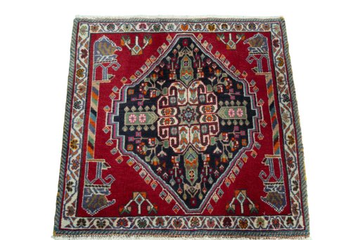 Surface texture of 2000s Shiraz rug with natural Wool and intricate pattern