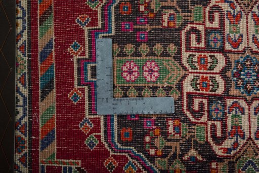 Backside of handmade 2000s Shiraz rug showing knot structure and weave density