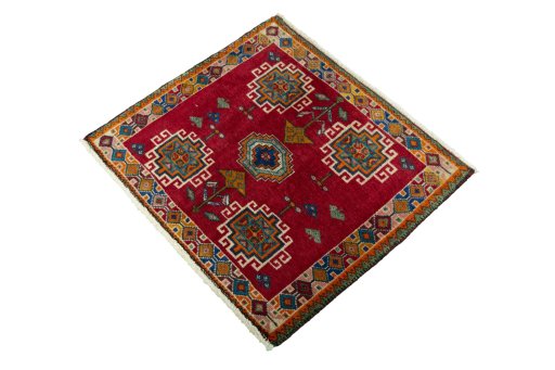 Corner detail of 2000s Shiraz rug showing border pattern and Wool pile