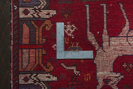 Backside of handmade 2000s Shiraz rug showing knot structure and weave density